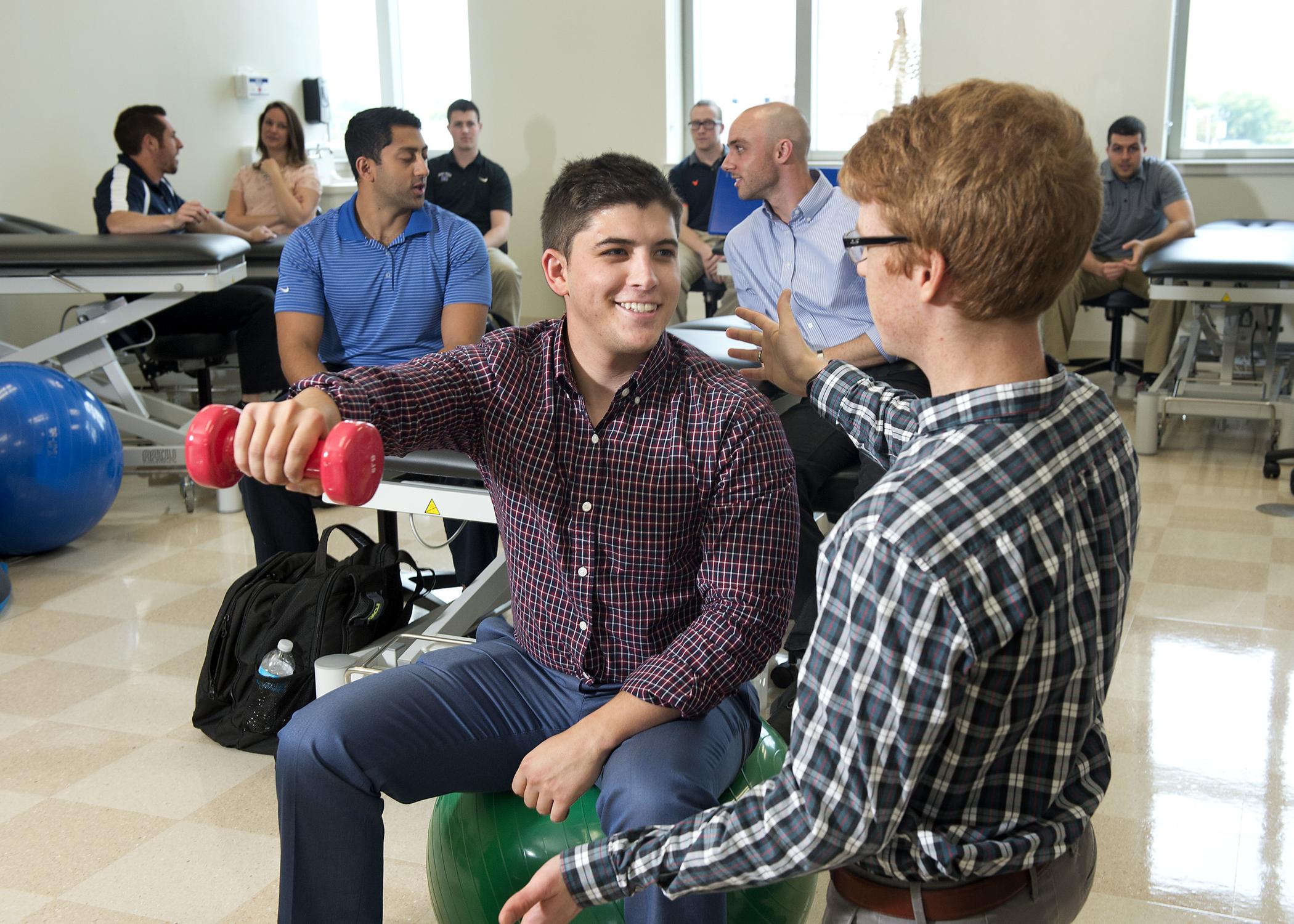 PT students learning in a lab